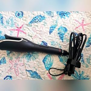 Chi spin and curl wand.